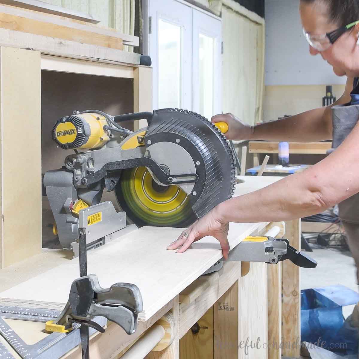 Cross-cutting bookcase pieces with a sliding miter saw. 