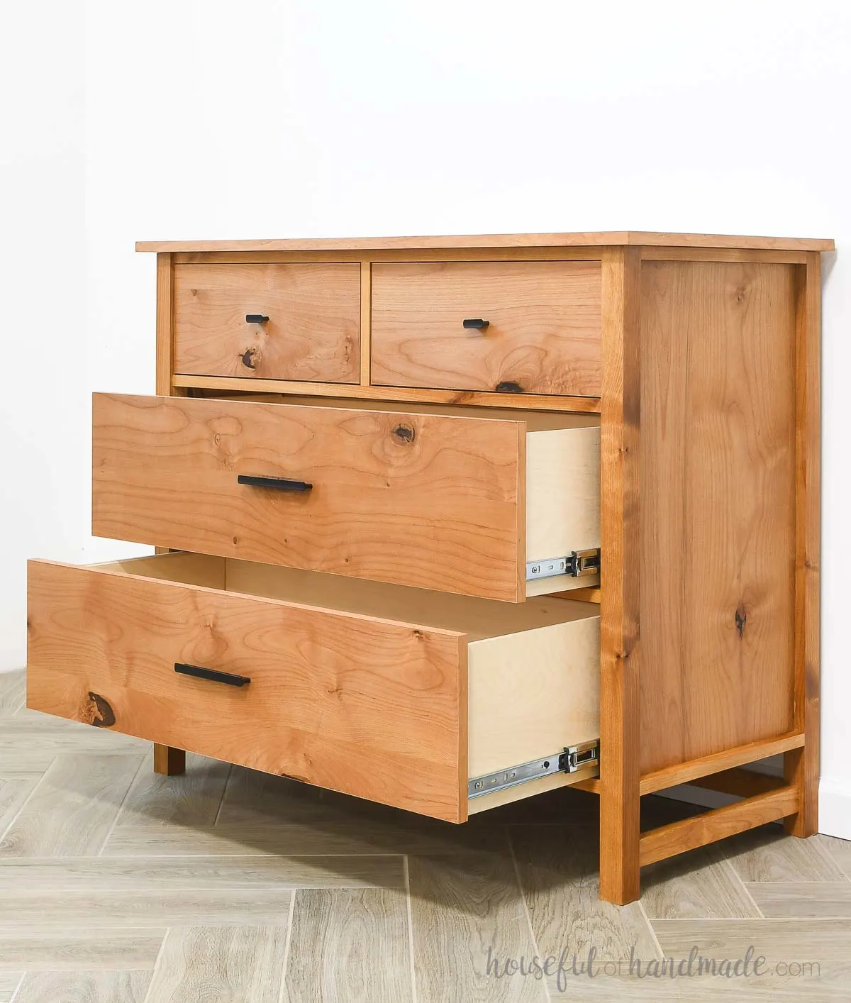 Alder dresser with 4 drawers and the two large bottom drawers open.