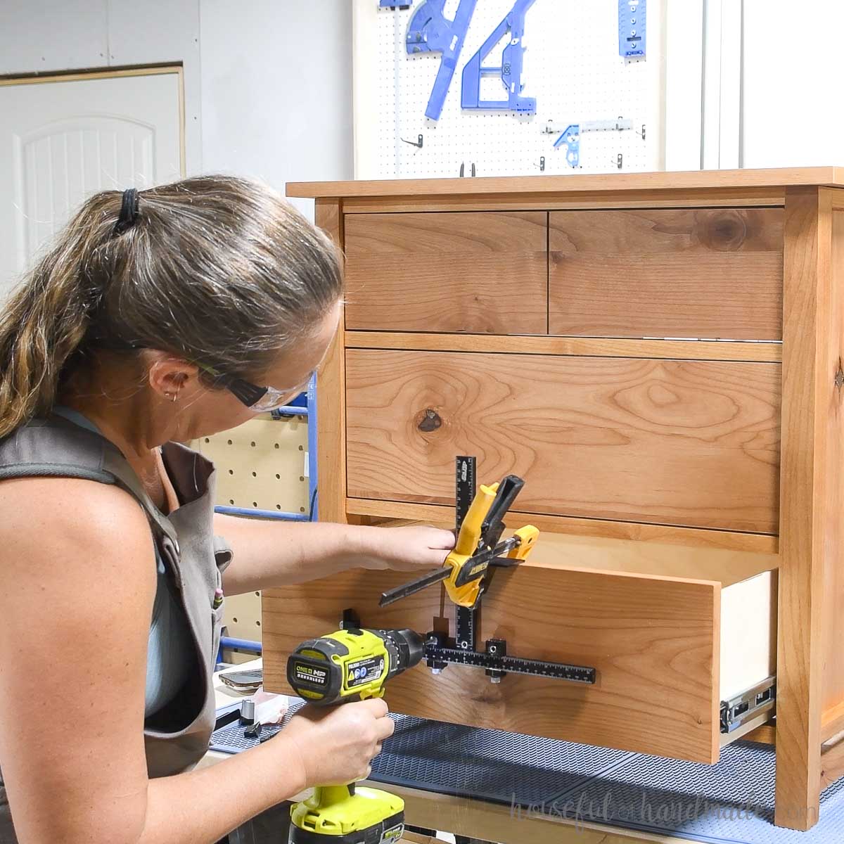 Using the Kreg Cabinet hardware jig to attach drawer pulls to the nightstand drawers. 