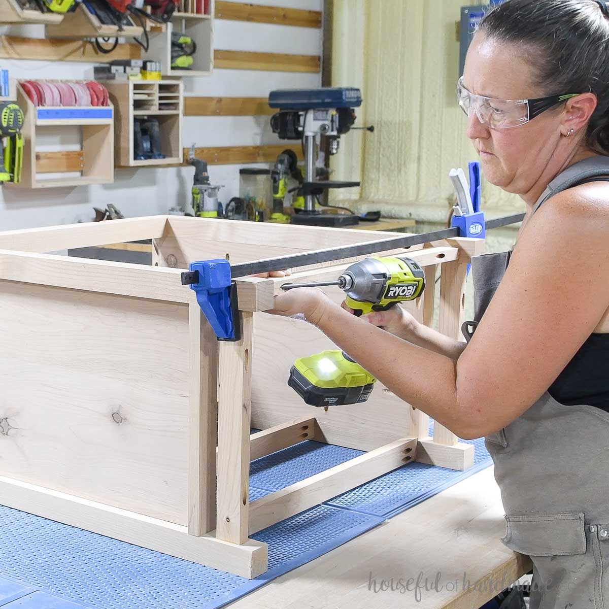 Attaching the back pieces to the nightstand. 