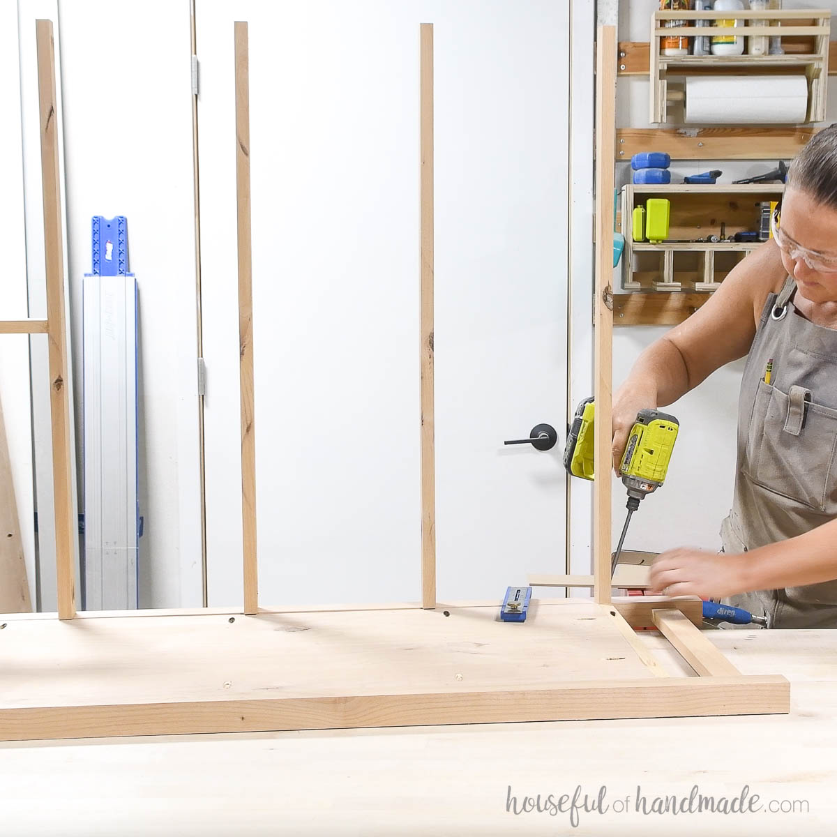 Attaching the remaining front face pieces to divide the lower drawer area.