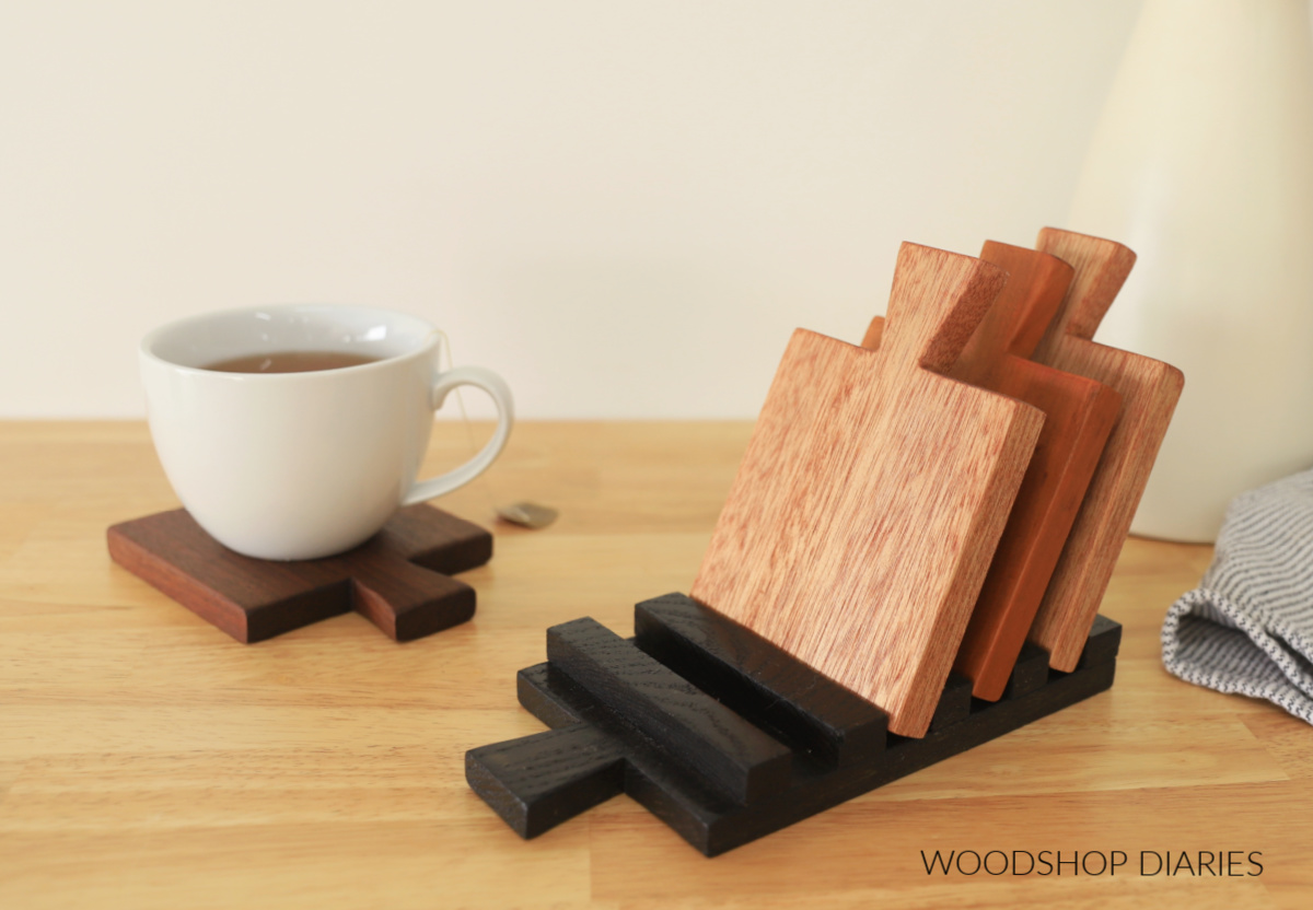 Cutting board shaped coasters with rack.