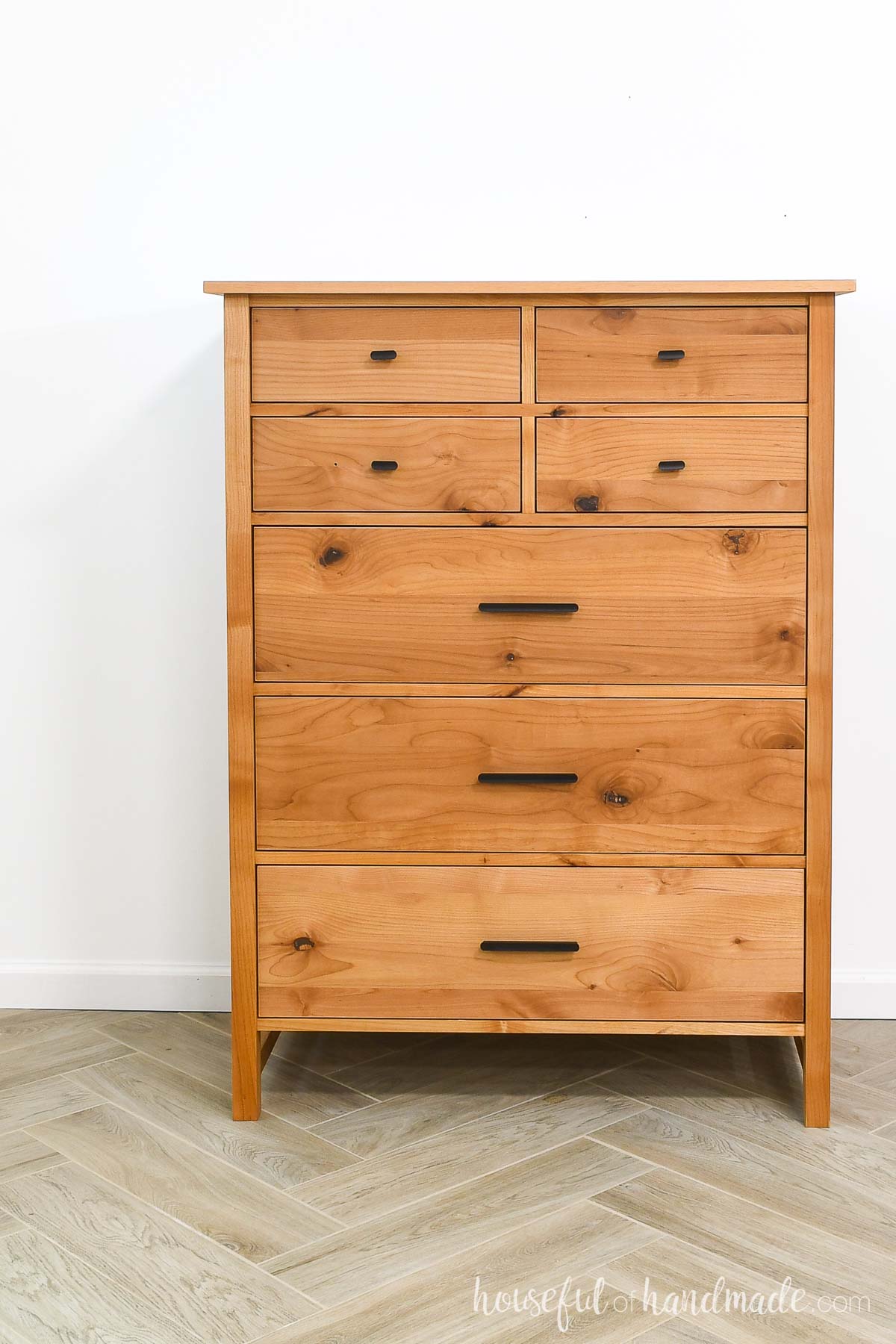 Tall dresser with 4 small drawers and 3 large drawers built from alder wood. 