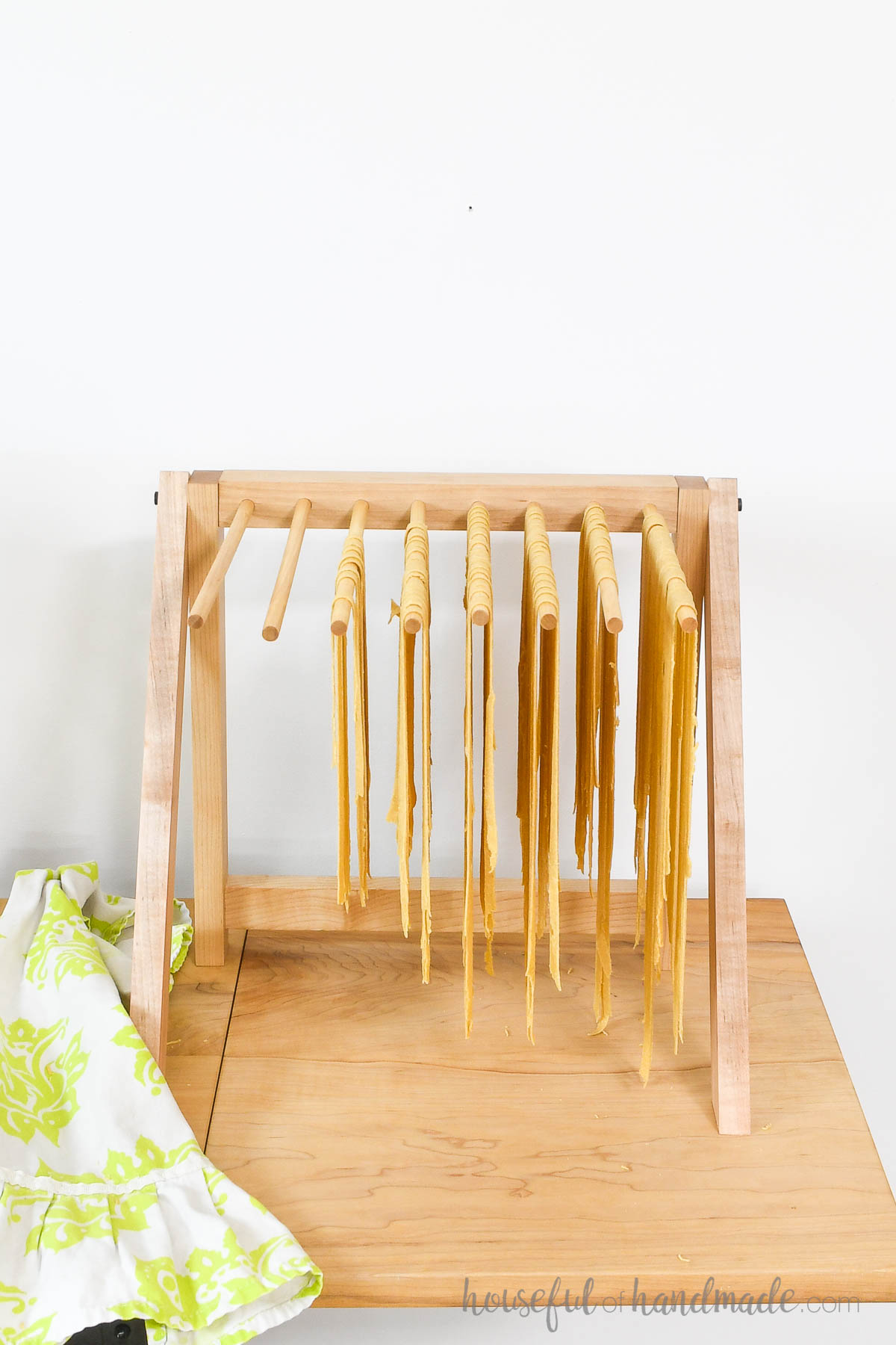 Folding rack with 8 dowels for drying homemade pasta and noodles. 