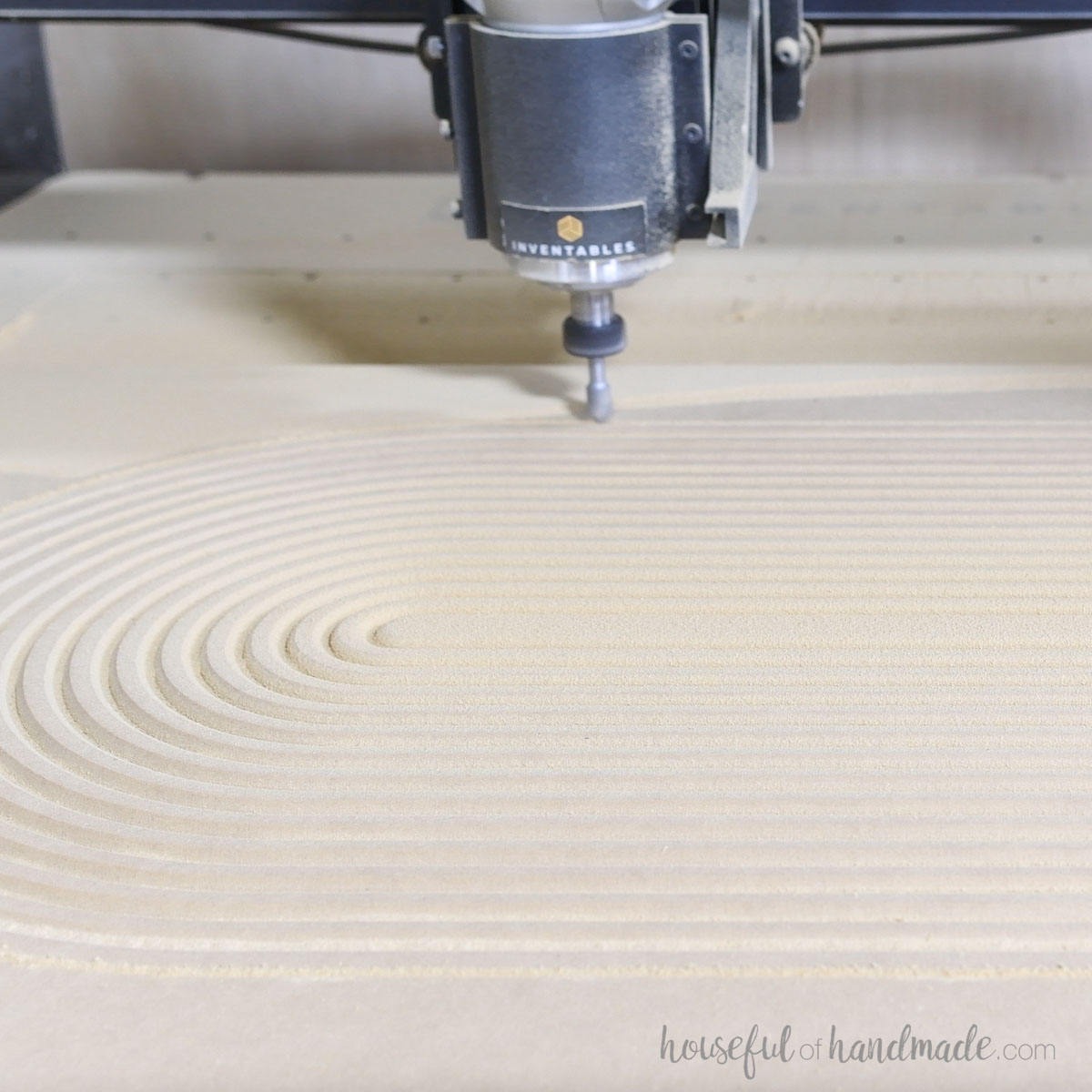 Carving an arched design in cabinet doors with a CNC. 