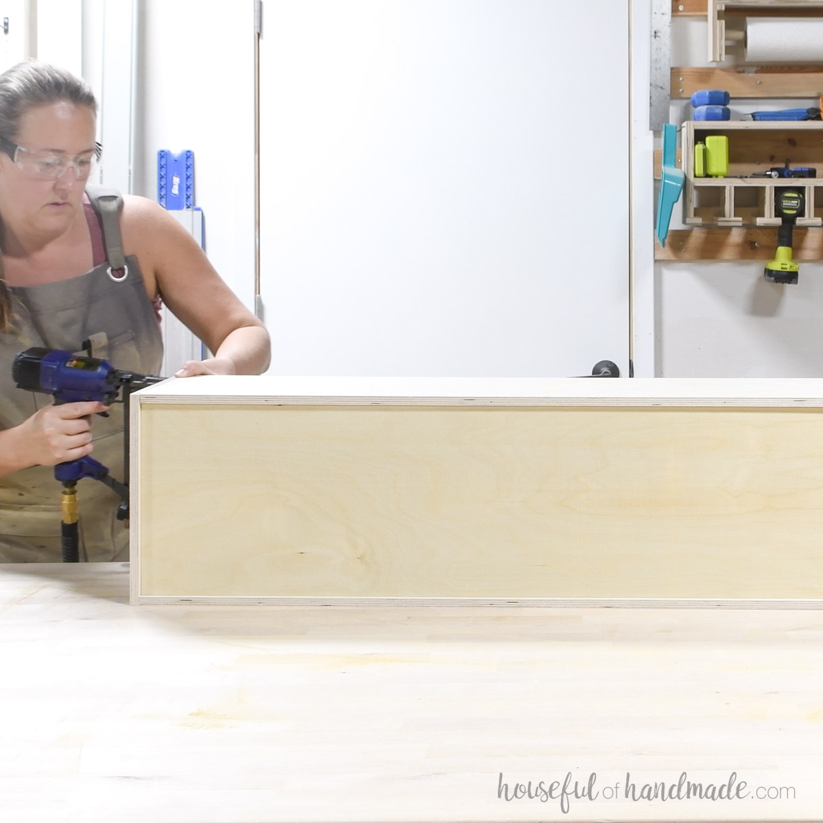 Building a drawer box with pneumatic staples. 