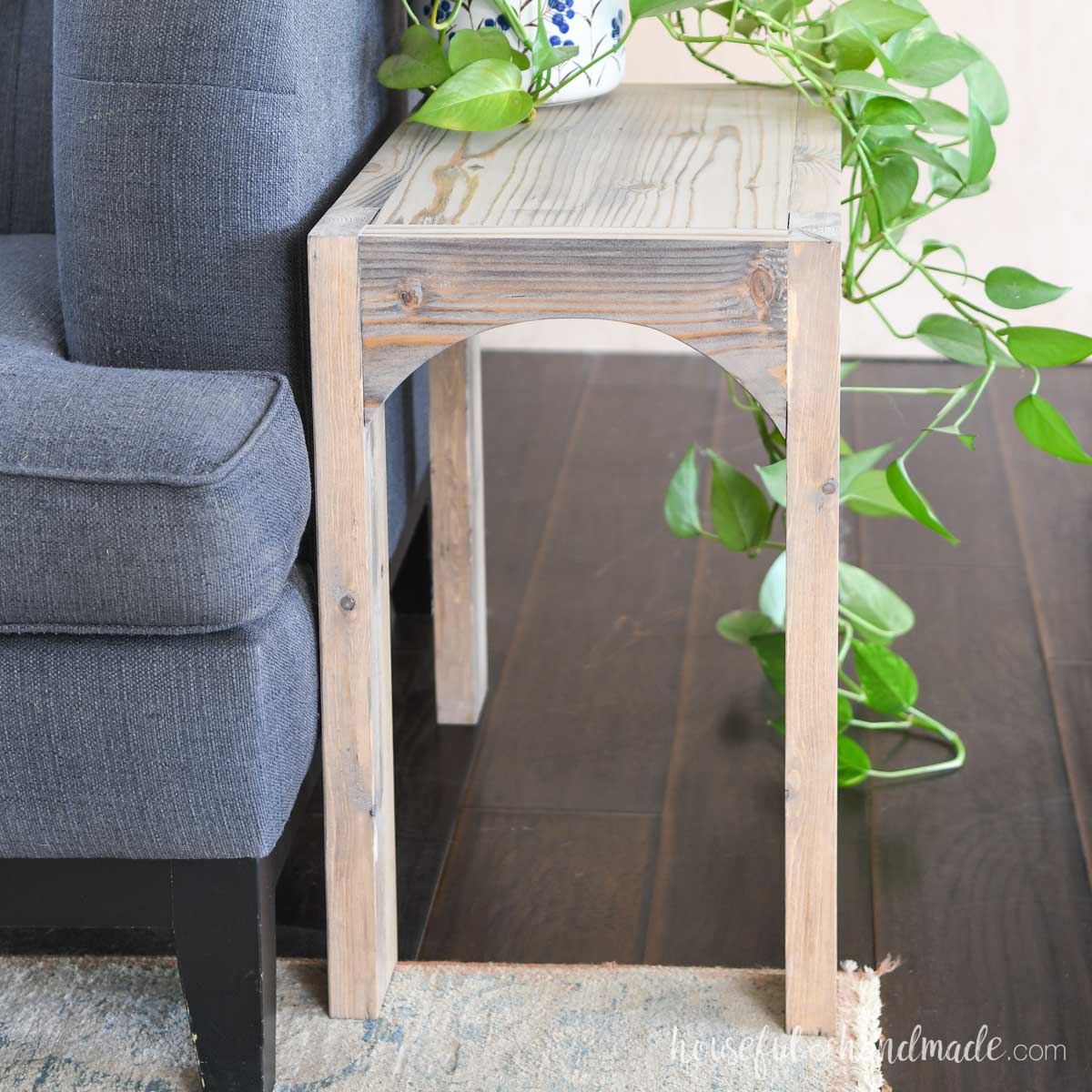 Chunky side table with only a top shelf and open below. 