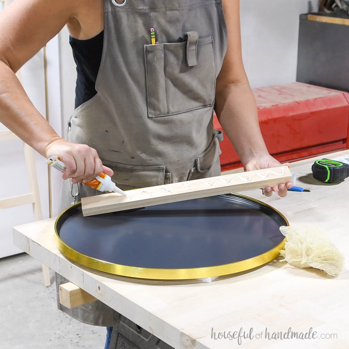 Glueing the mirror to a 1x2 board.