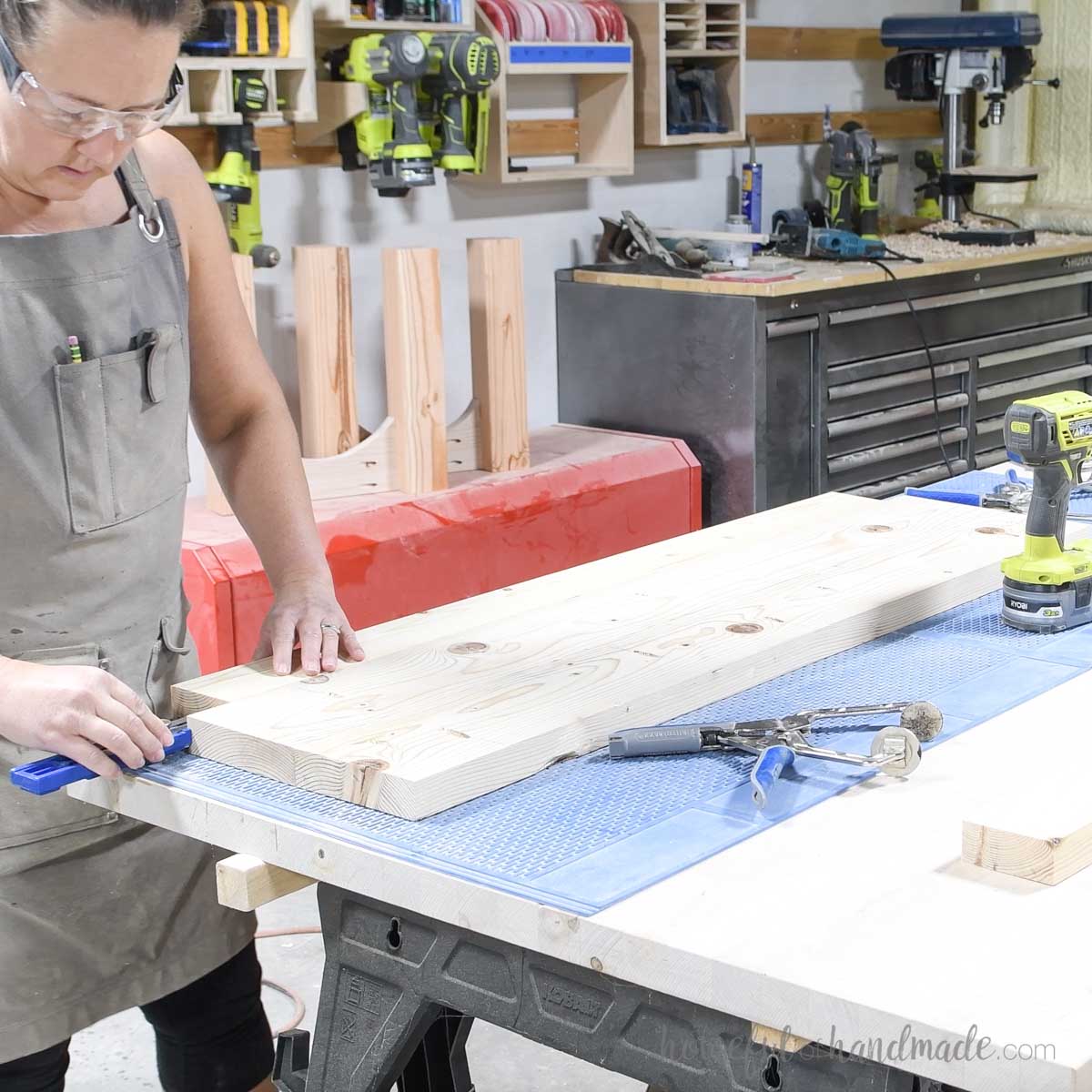 Measuring the ends of the board before attaching. 