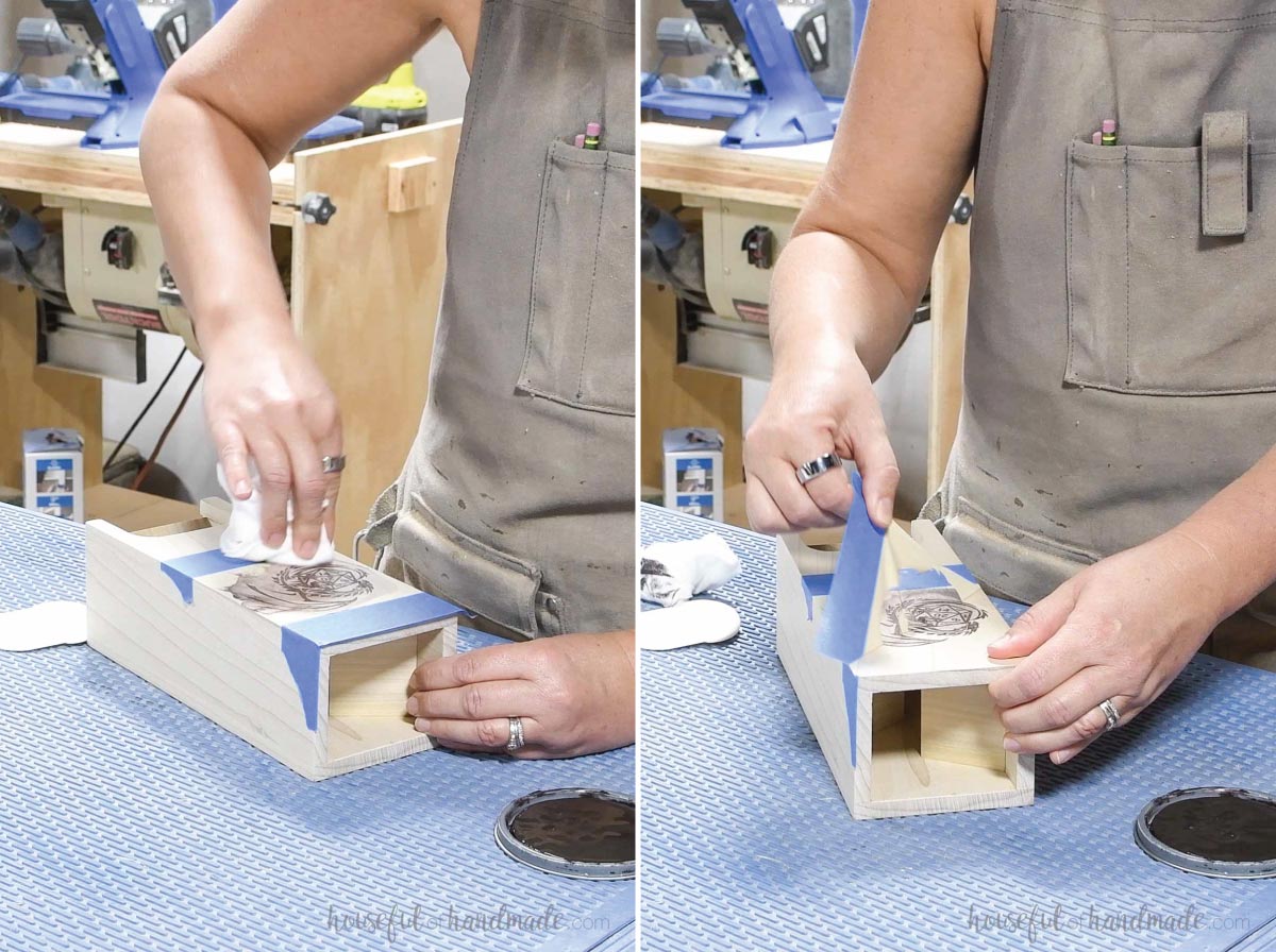 Adding a design to the front of the dice tower with stain over a vinyl stencil. 