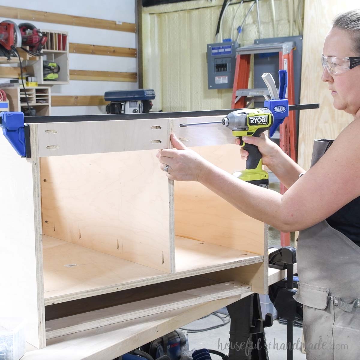 Attaching top supports to the cabinet. 