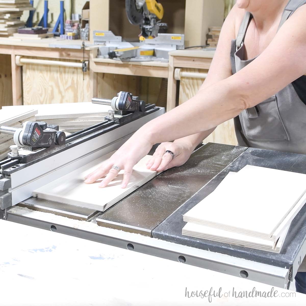 Cutting a groove in the bottom of the drawer box pieces on a table saw. 