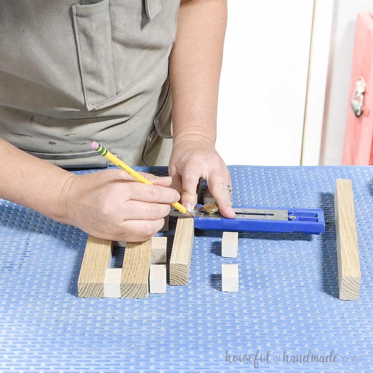 Marking spacing on the sides of the boards. 