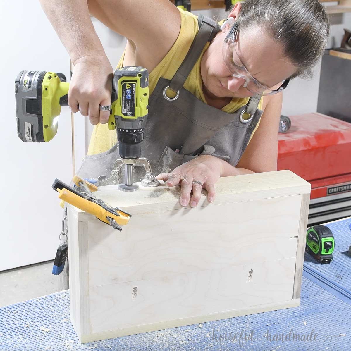 Drilling offset holes for drawer pulls. 