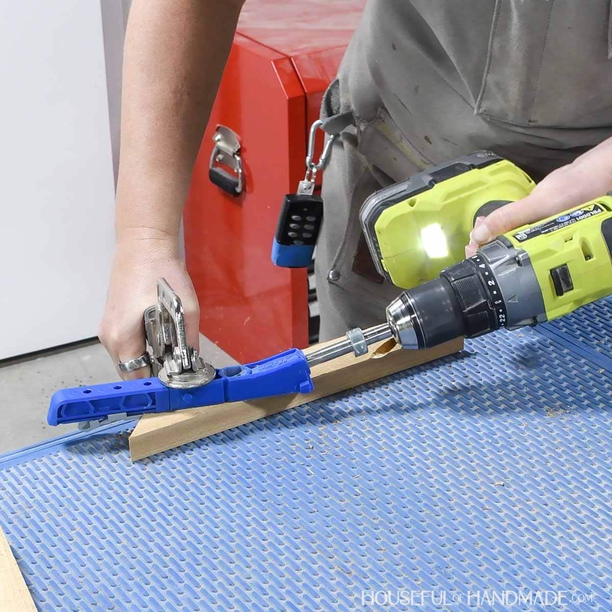 Adding pocket holes to the top of frame mitered pieces. 