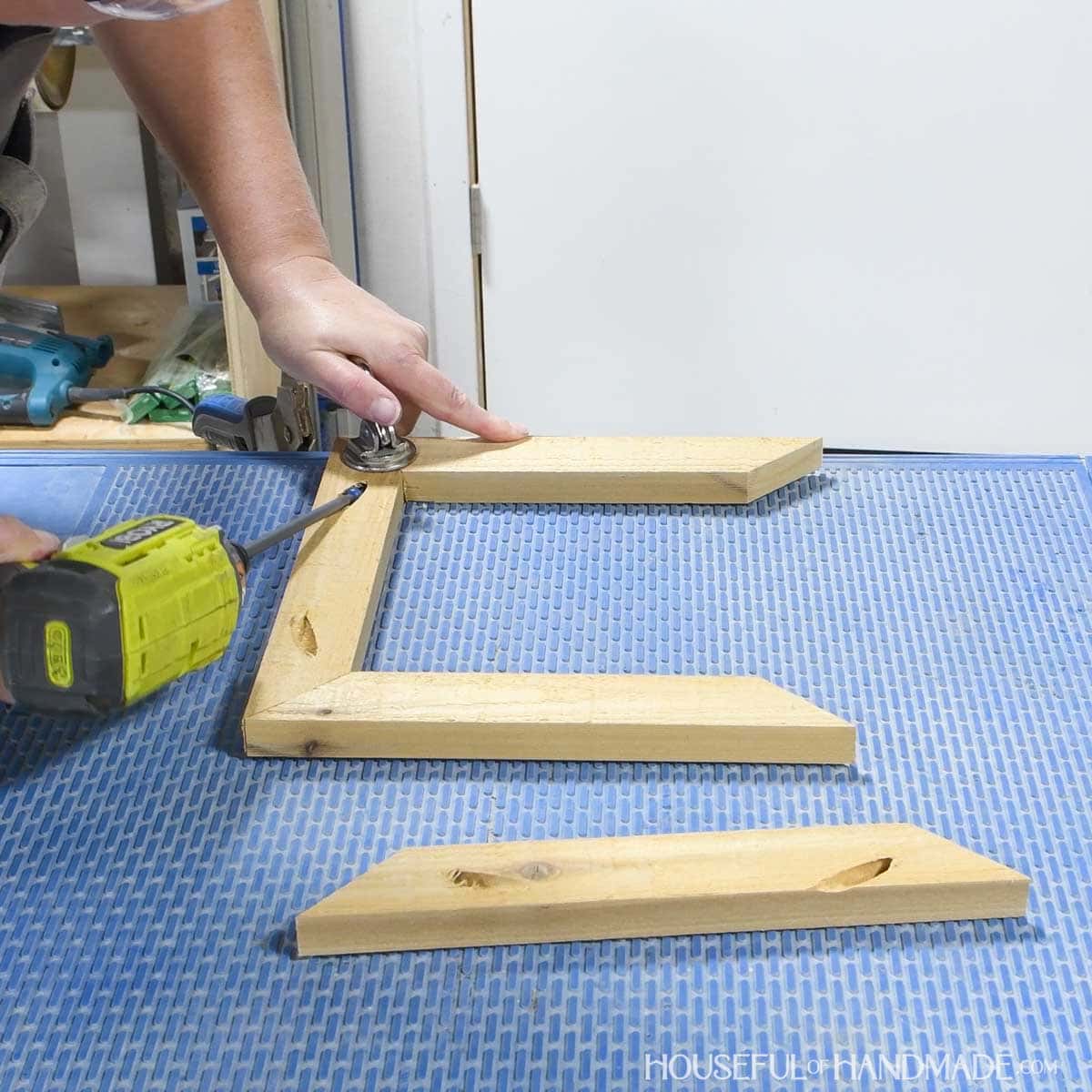Building a frame for the planter top with mitered corners and pocket hole joinery. 