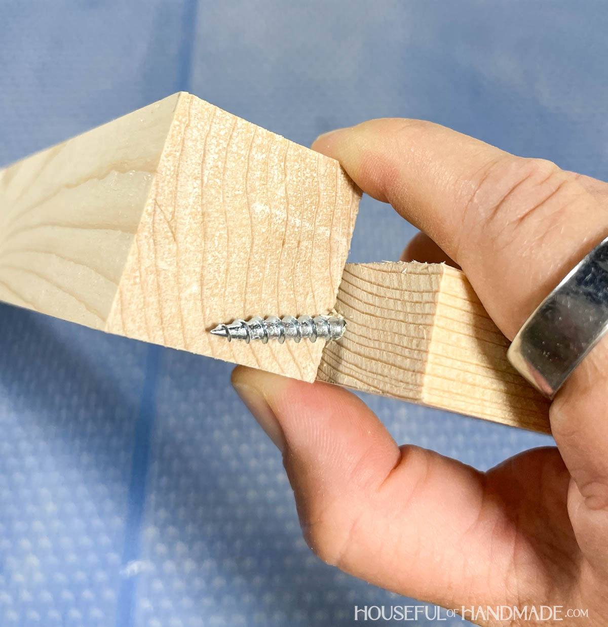 Checking screw length on different sized pieces of wood.