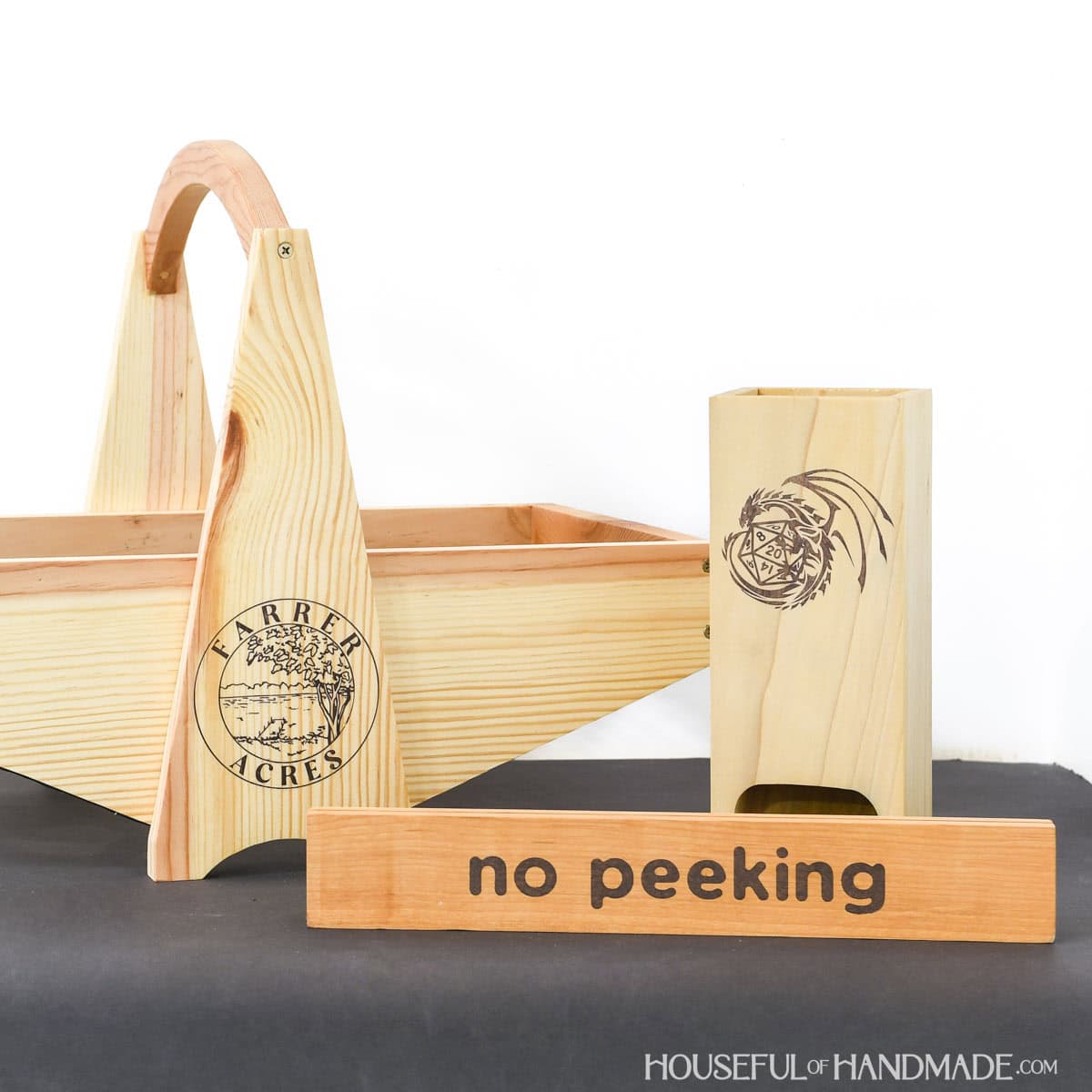 Harvest basket, dice tower and playing card holder with fake laser engraved design on the front. 