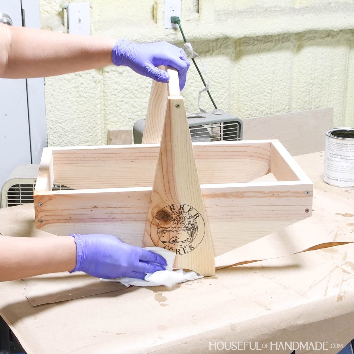 Applying food safe sealer to the harvest basket.