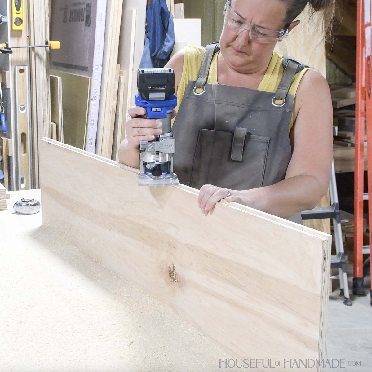 Routing a groove in the back edge of the side board. 