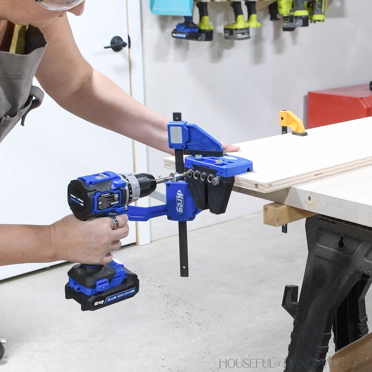 Drilling dowel holes in the edge of a board with the Kreg Dowel jig. 