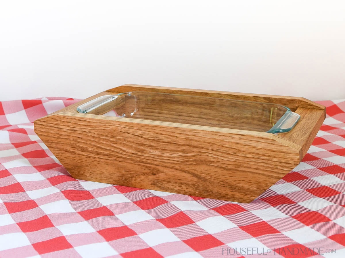 Wood casserole dish carrier for a 7x11 glass baking dish.