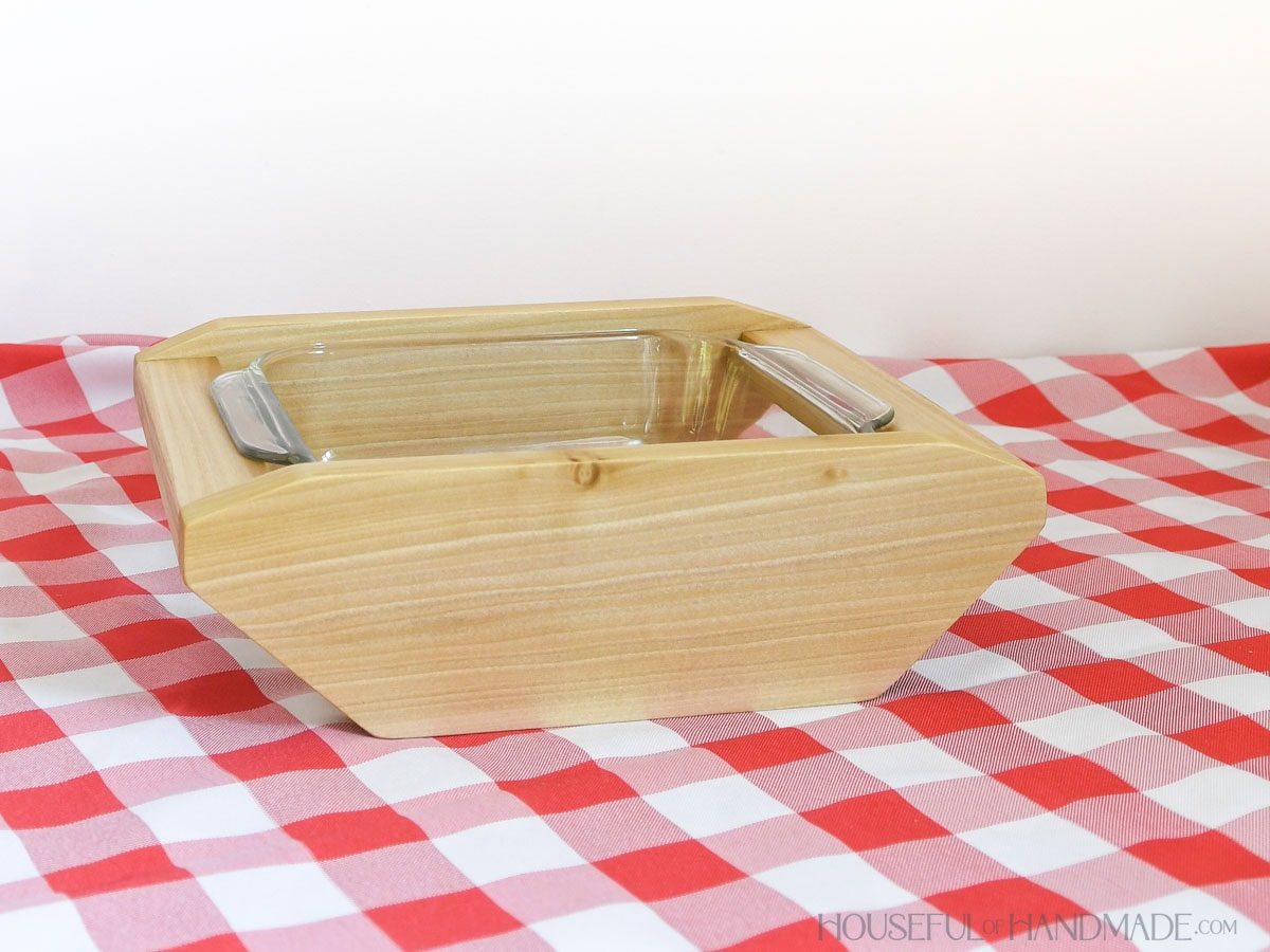 Wood casserole dish carrier for a 8x8 glass baking dish.