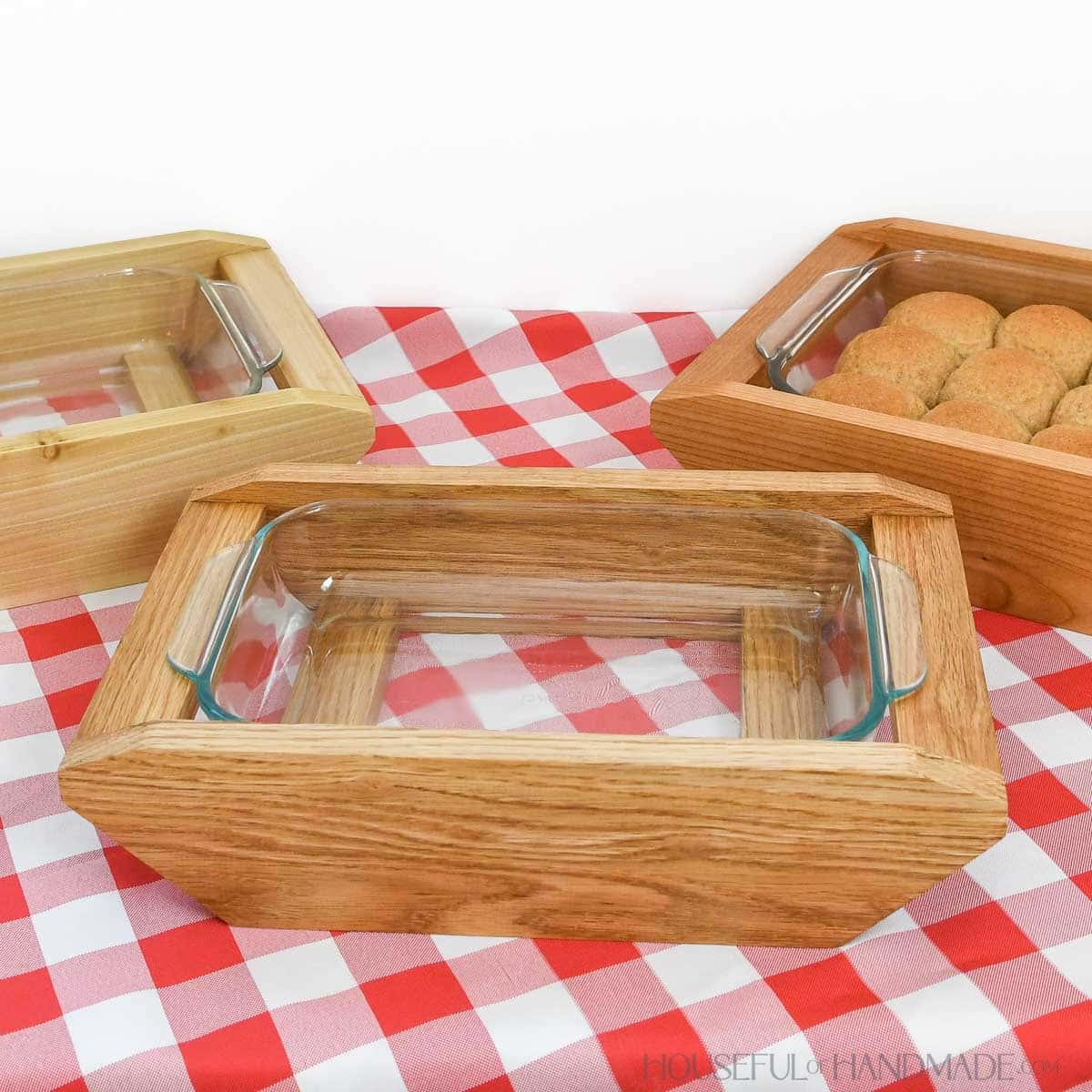 Beautiful modern casserole dish carriers with glass baking pans inside.
