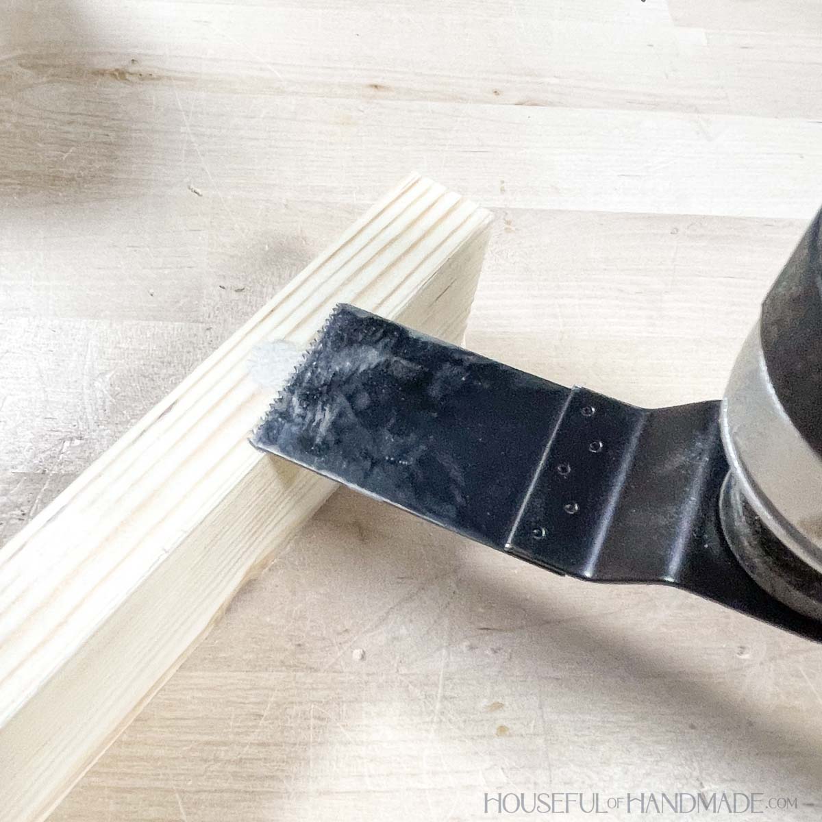 Filing a mis-aligned dowel hole with a spare dowel pin and cutting it off. 