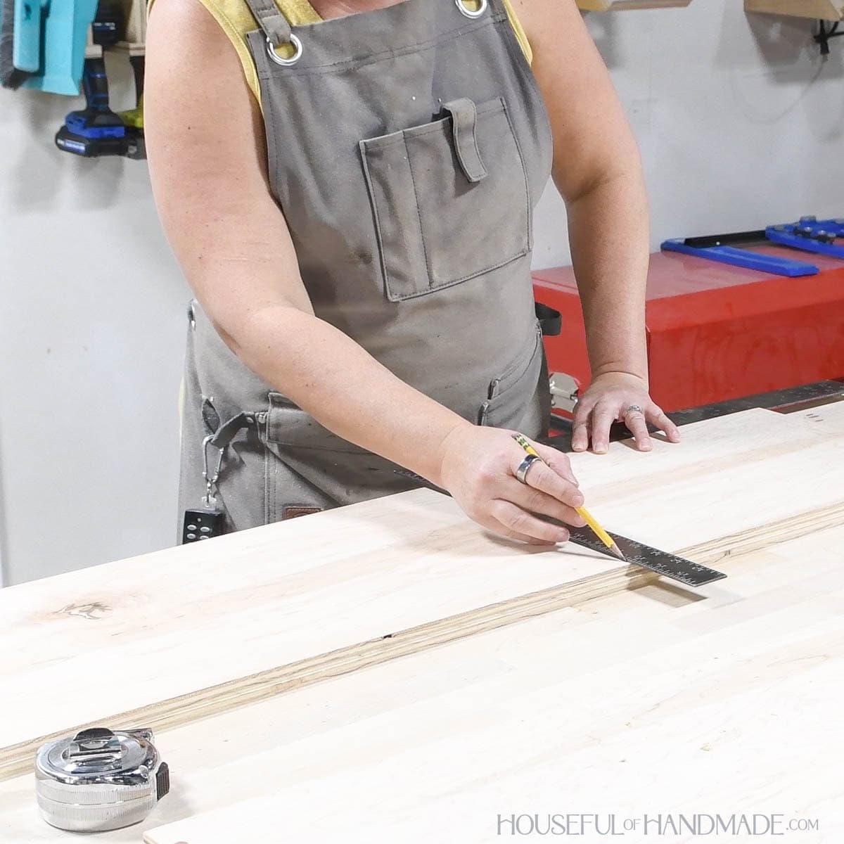 Drawing lines for shelf alignment. 