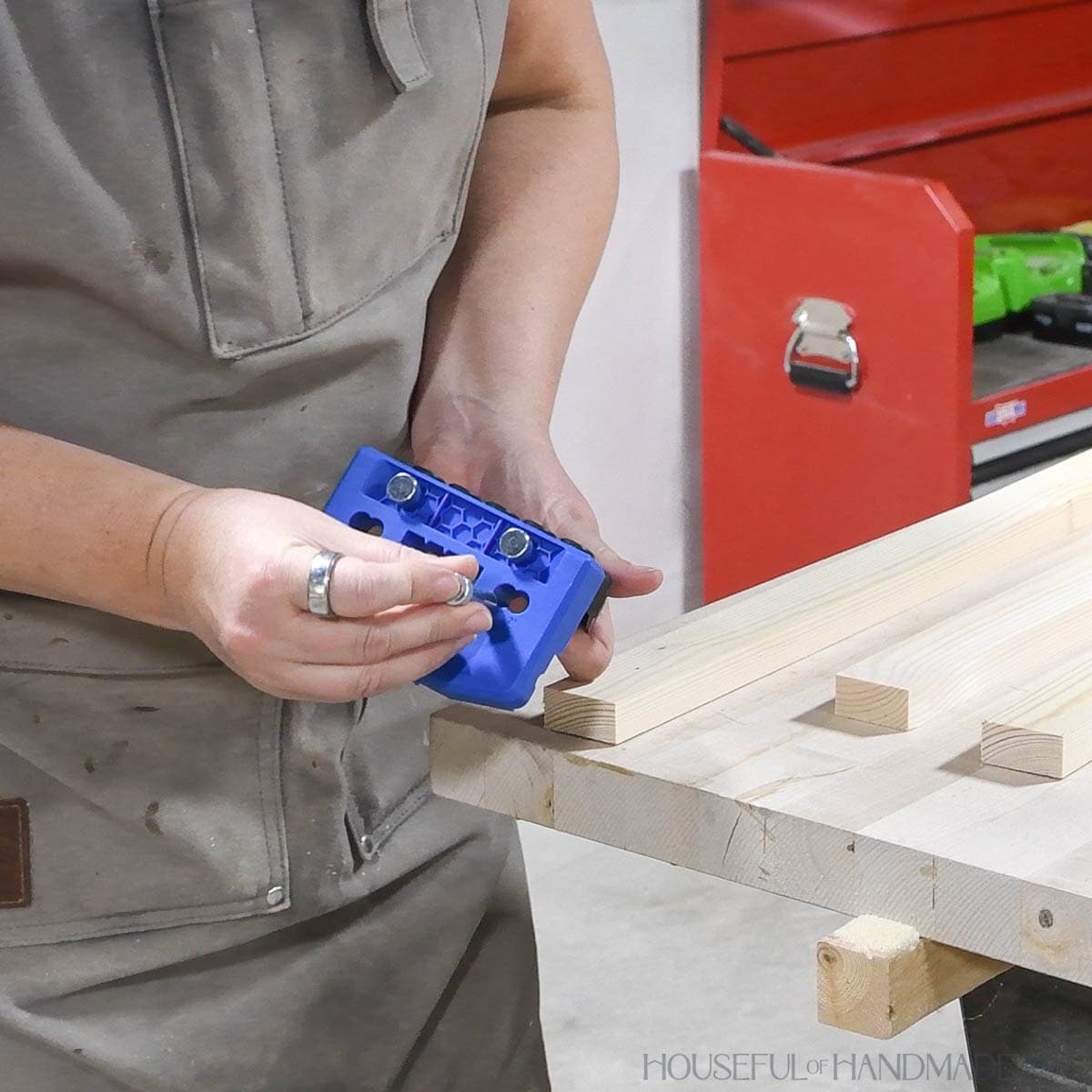 Placing index pin in figure 8 hole in the front of the Kreg dowel jig. 