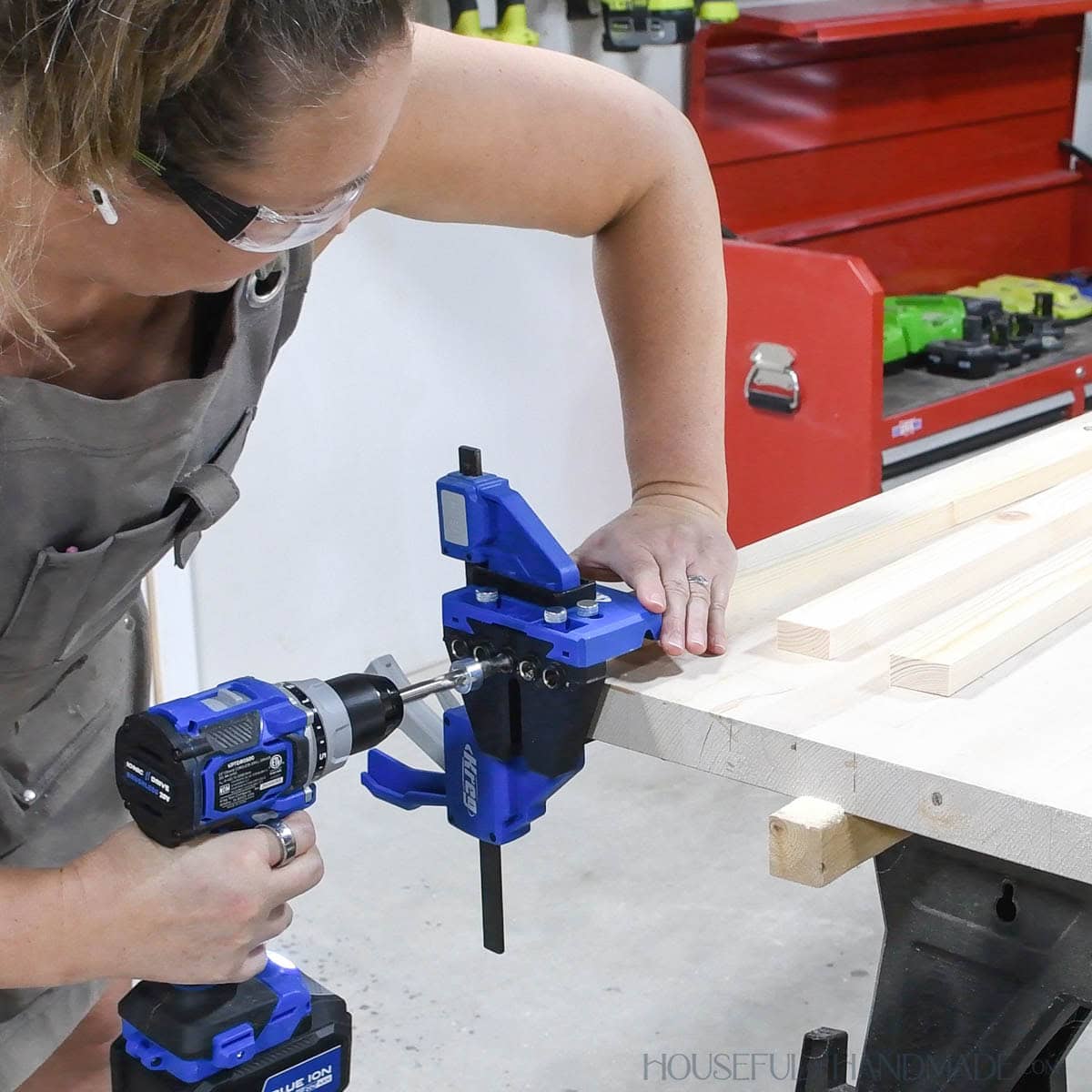 Drilling dowel holes in the end of a 1x2 board with the Kreg Dowel jig. 