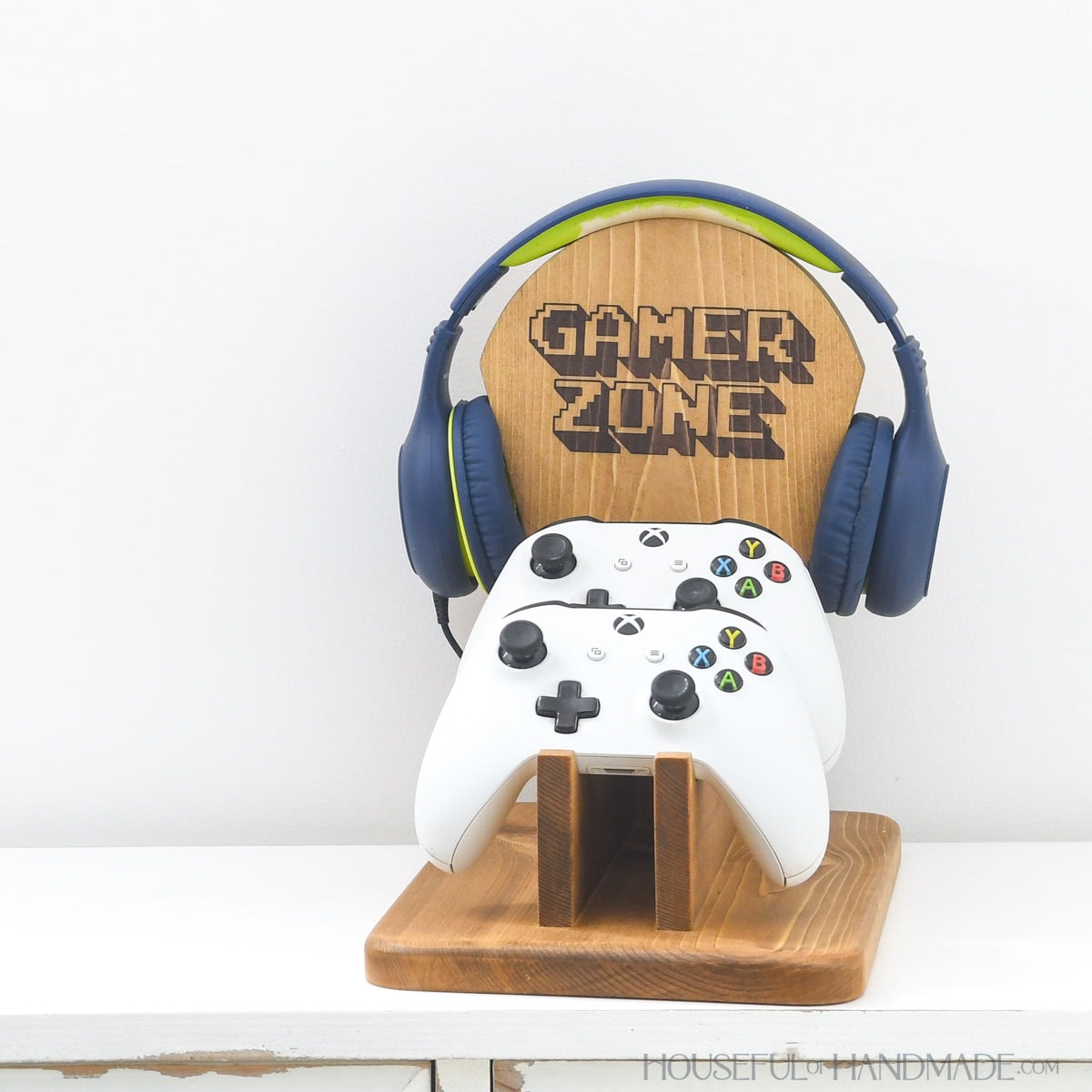 DIY game controller and headphone stand with "Gamer Zone" design on it.