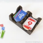 DIY playing card tray stained dark walnut with card game inside.