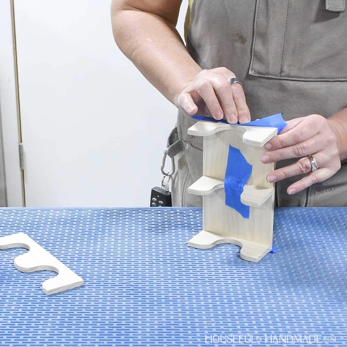 Glueing the side pieces to the ends of the base. 