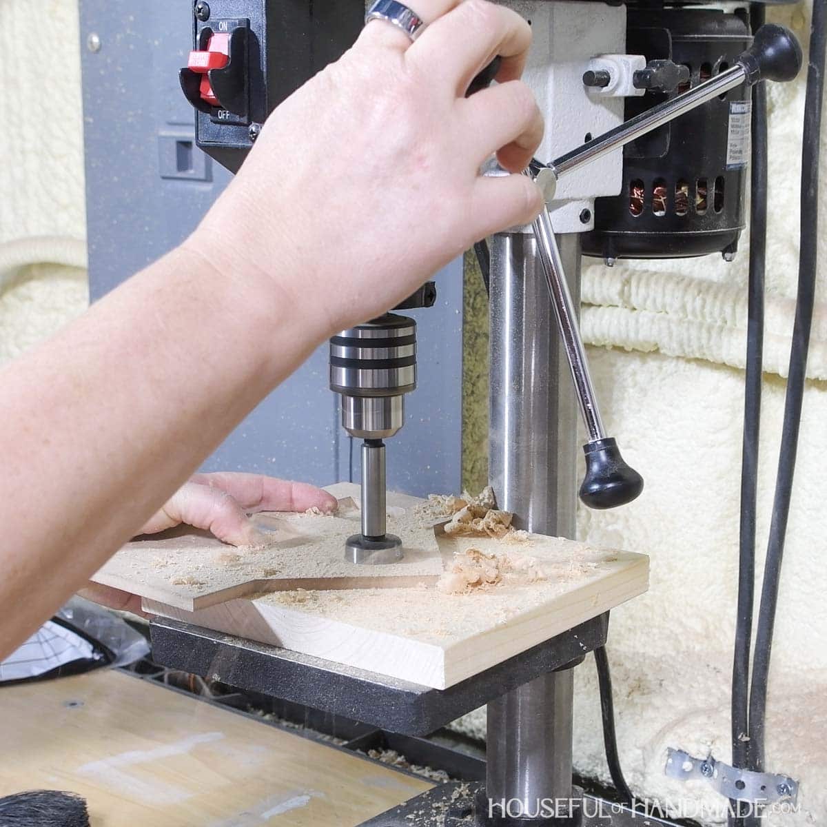 Drilling a hole for a round window.