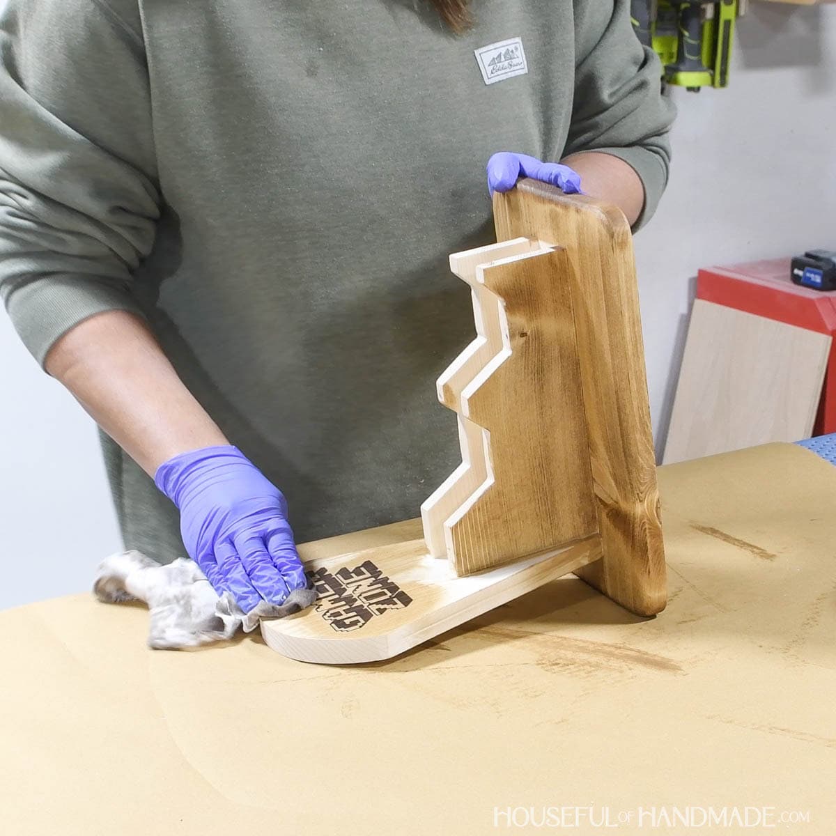 Staining wood controller holder with Early American stain.