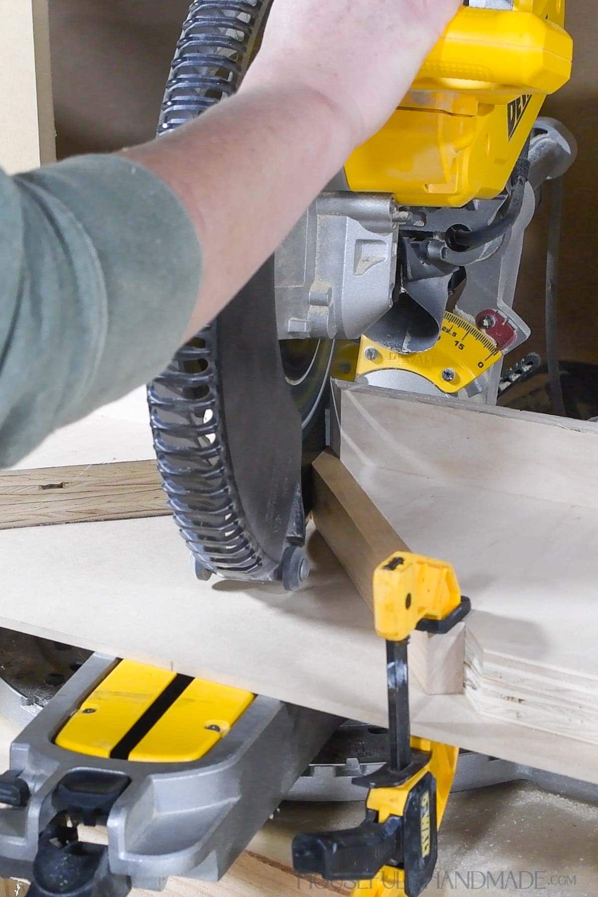 Cutting a sharp angle on a miter saw with a DIY jig.