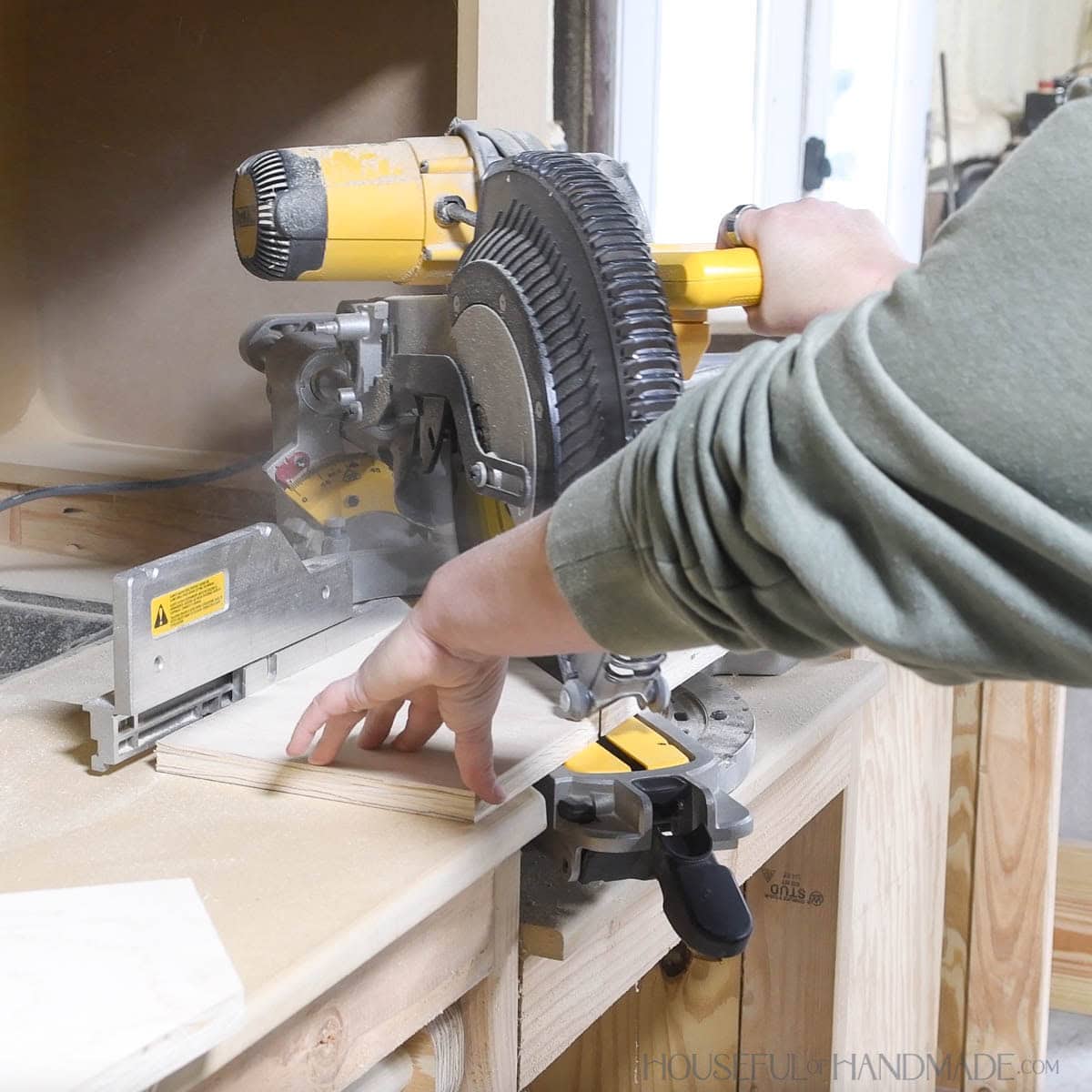 Cutting fence pieces at 45 degree angle.