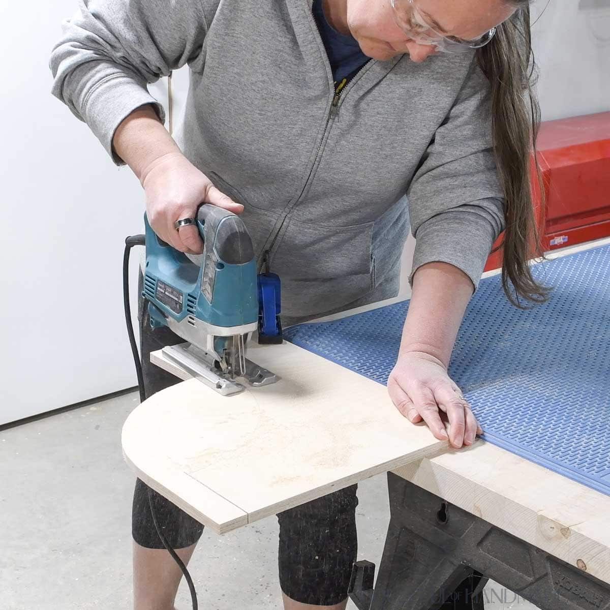 Cutting out the side pieces with a jig saw. 