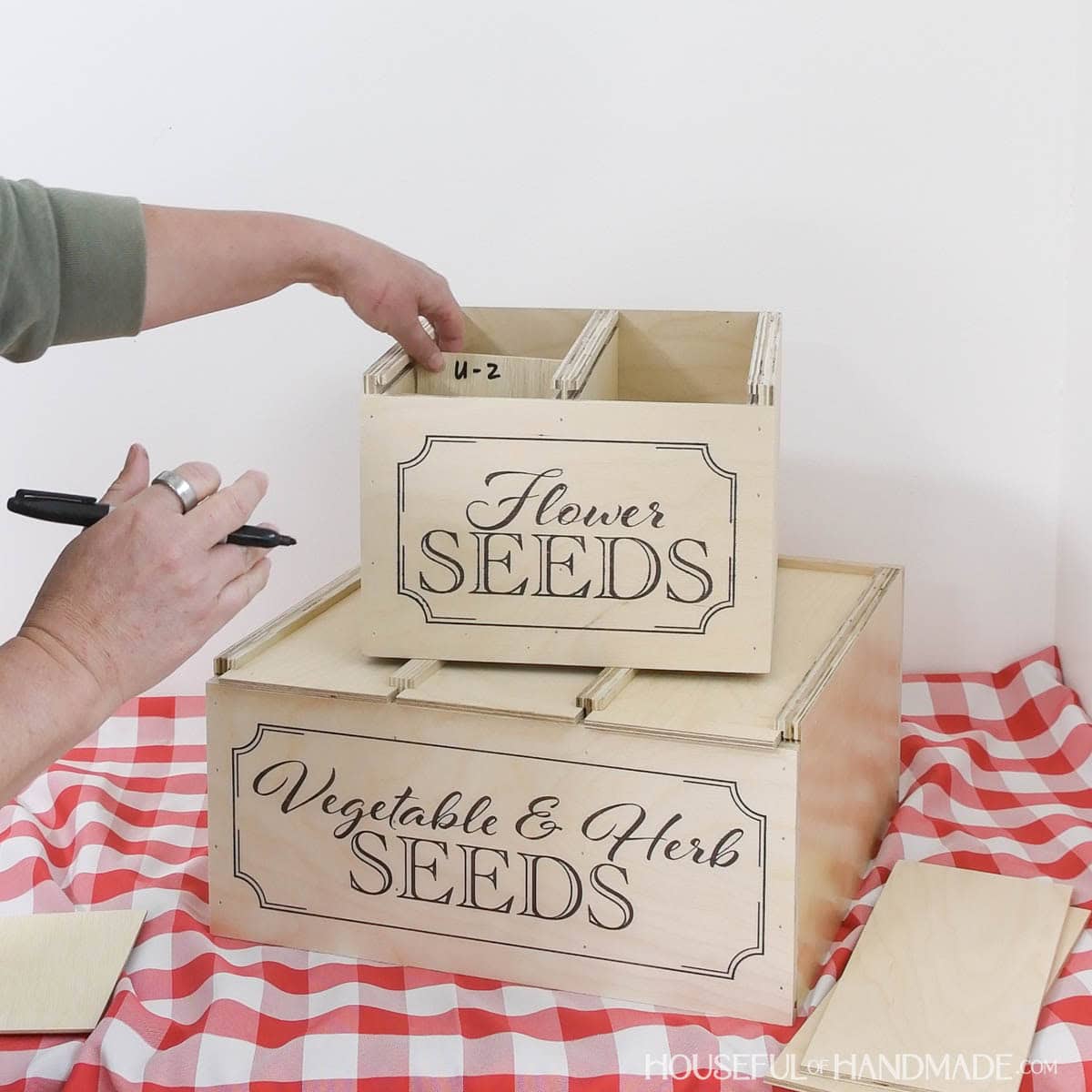 Organizing seeds in a storage box with dividers cut from 1/8" plywood.