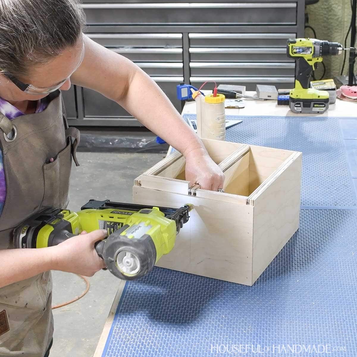 Attaching the center divider in the seed packet box.