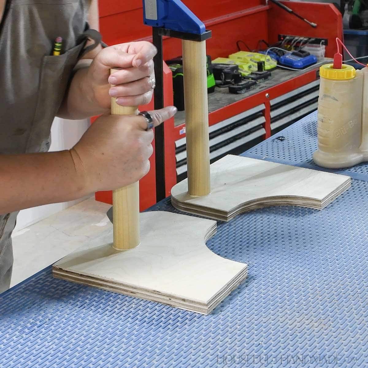 Gluing large dowels inside the holes on the sides. 