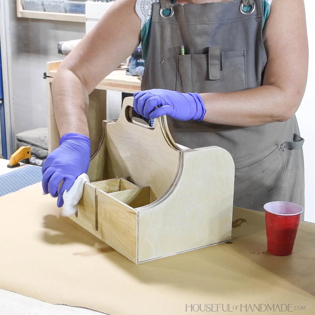 Sealing the canning accessory caddy with a wipe on polyurethane. 