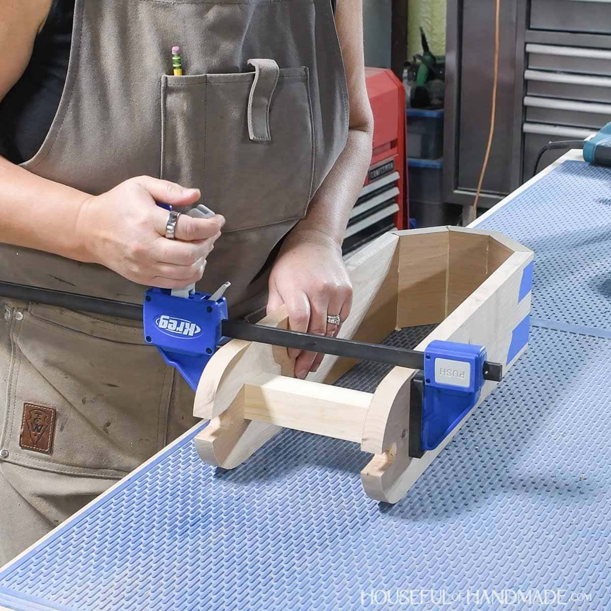 Clamping a scrap between the top and letting dry. 