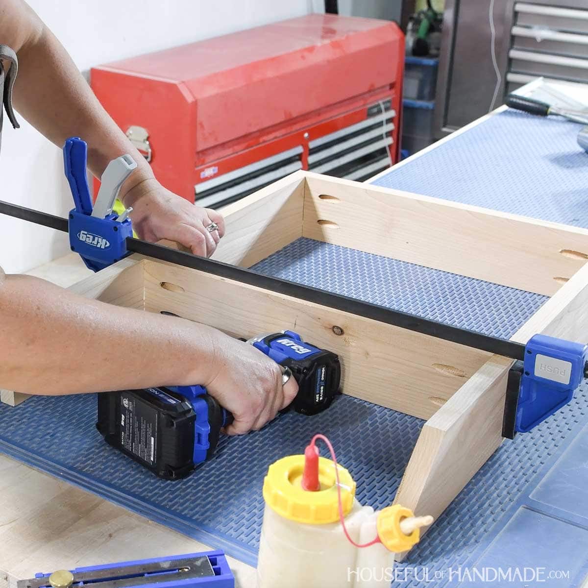 Attaching the second side of the shelf unit.