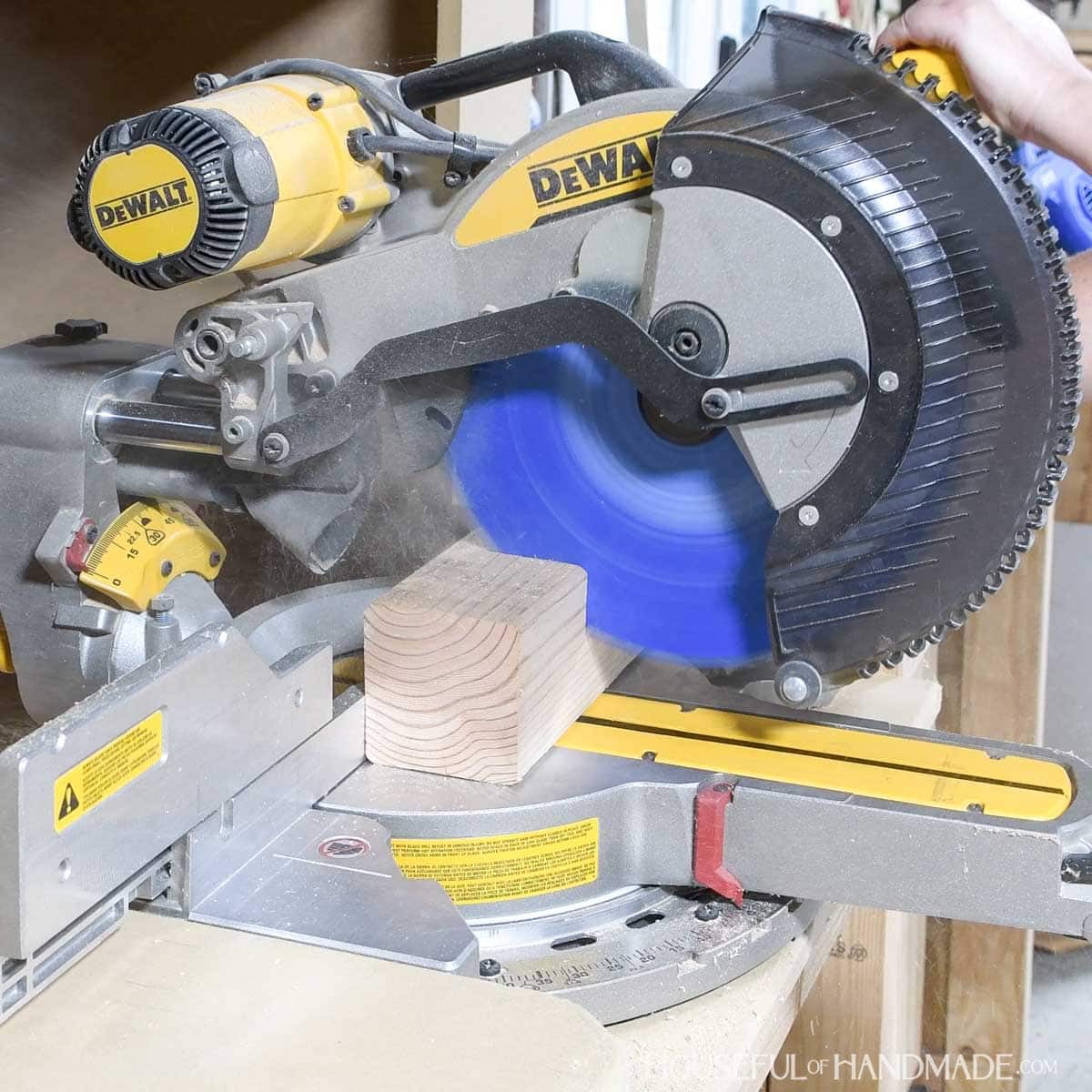 Cutting 4x4 block on miter saw.