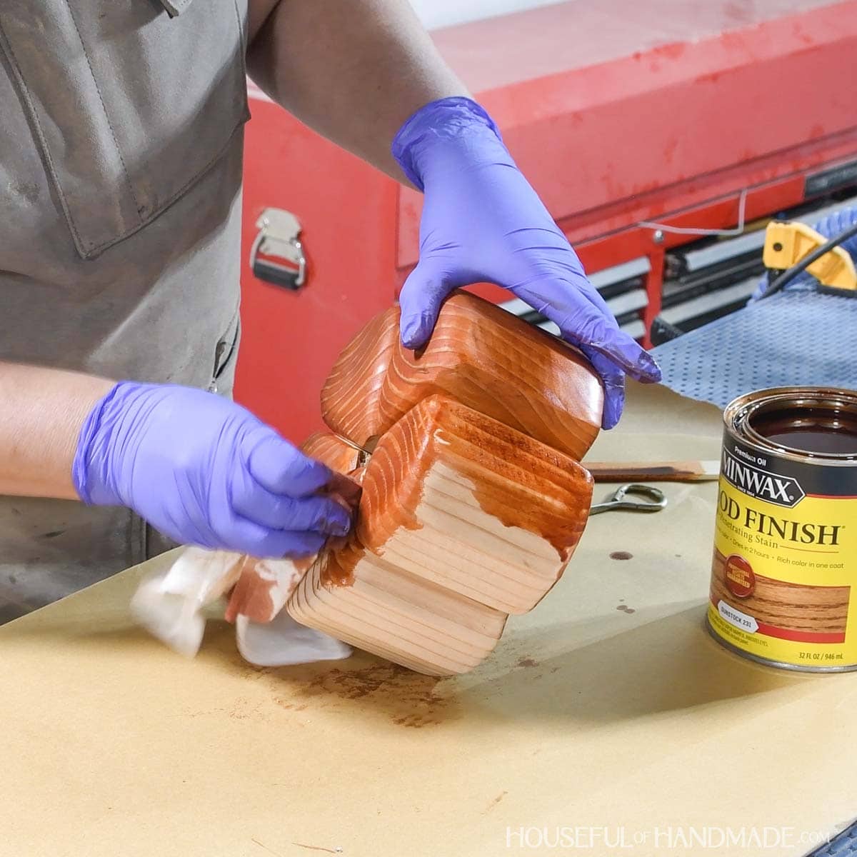 Staining wood pumpkin orange.