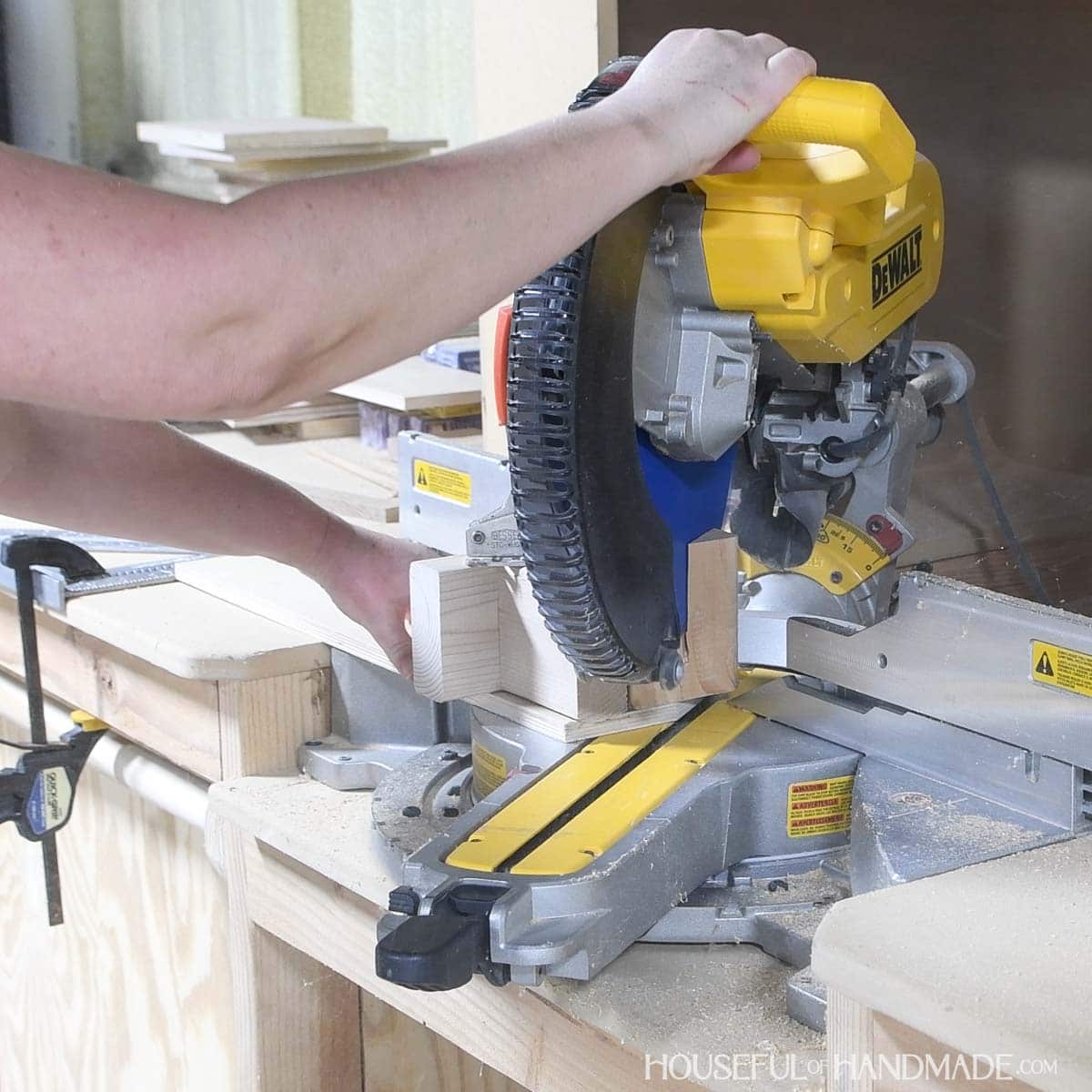 Cutting corners off blocks with jig.