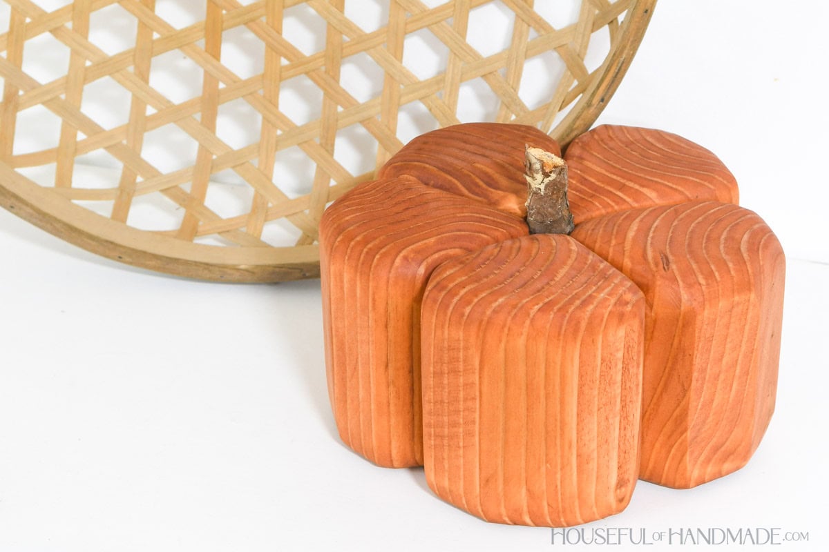 DIY pumpkin from wood blocks stained orange.